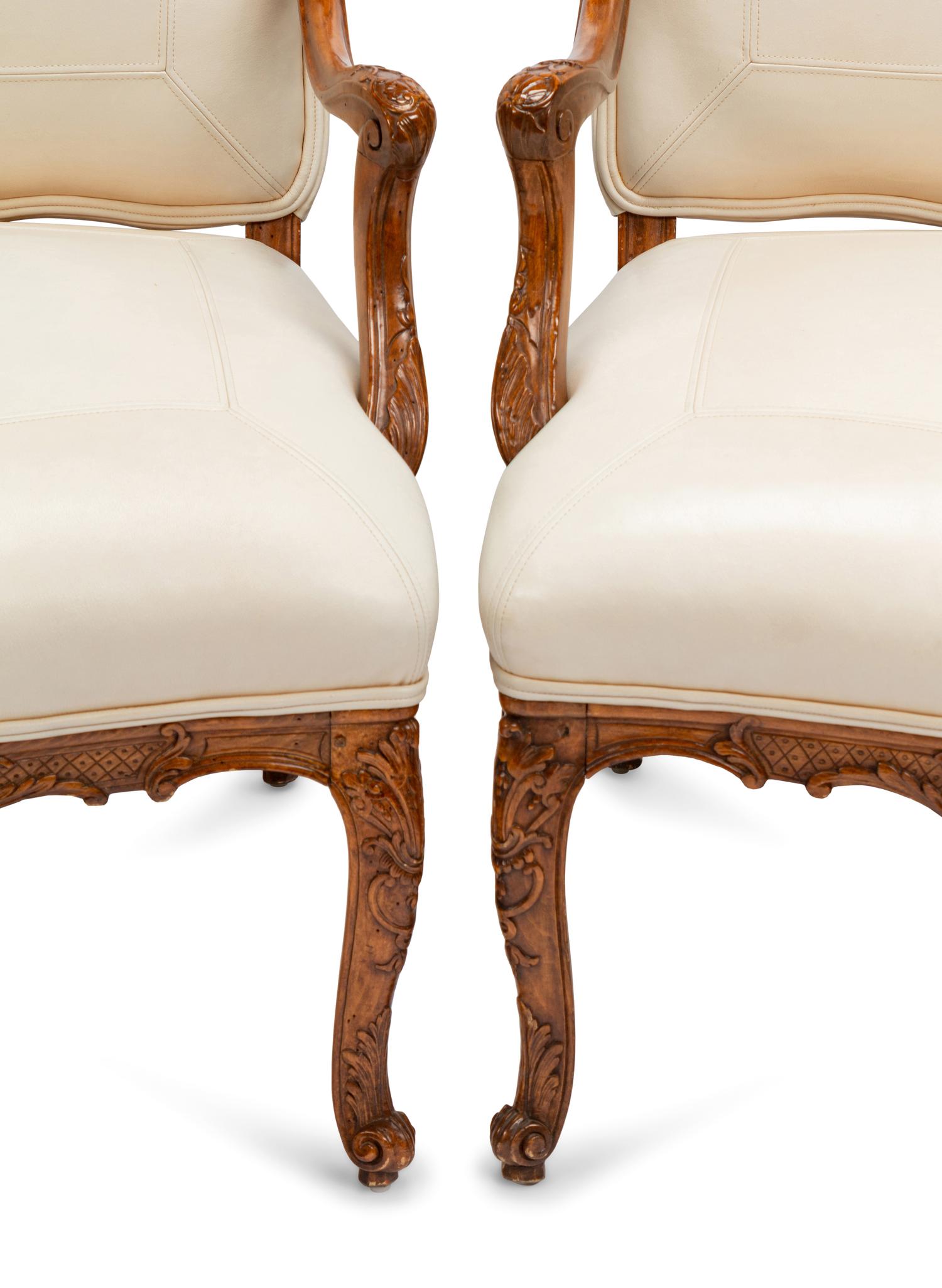 A Set of Four Régence Style Leather-Upholstered Armchairs