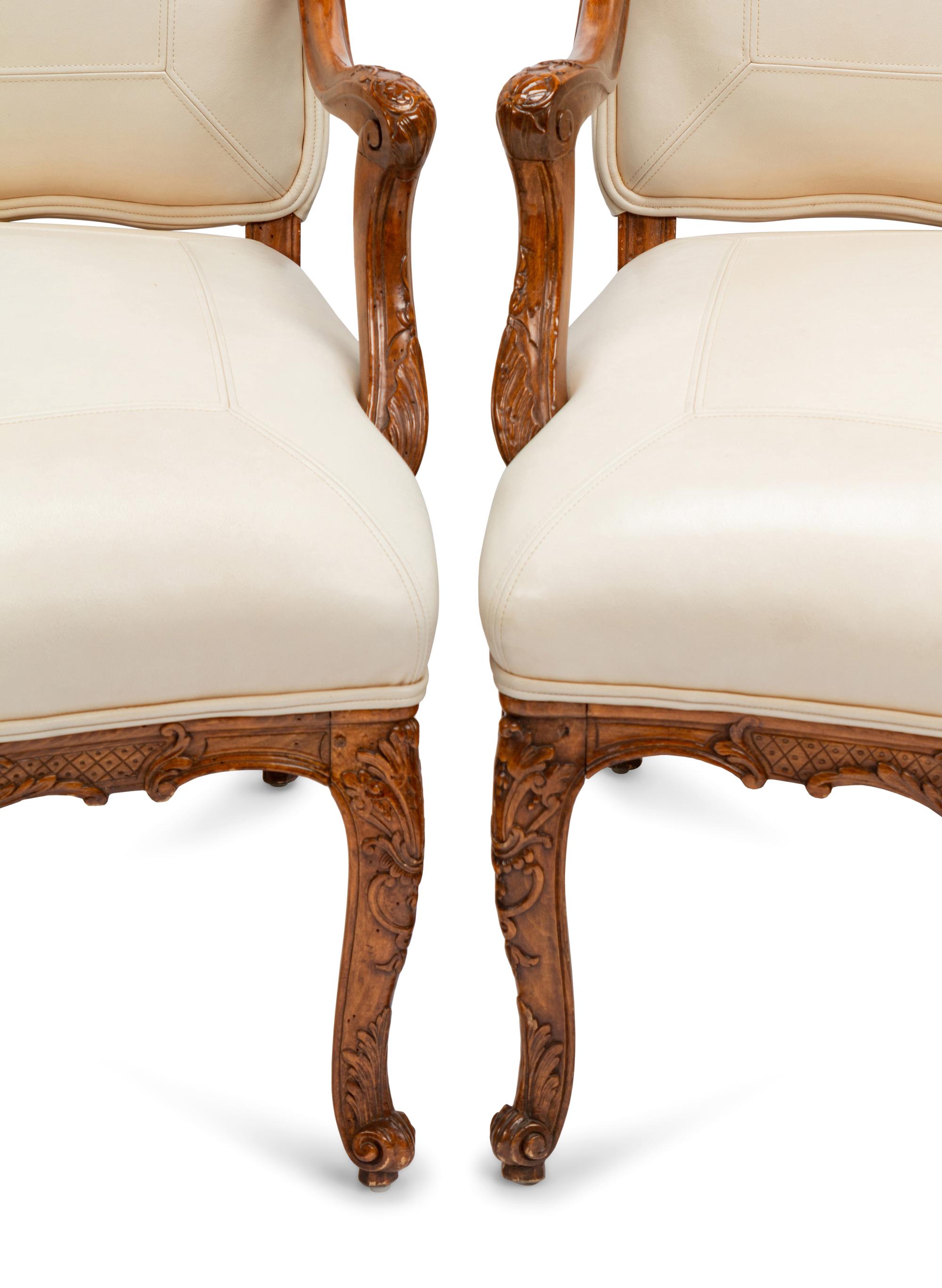 A Set of Four Régence Style Leather-Upholstered Armchairs