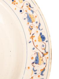 A Dutch Glazed Earthenware Armorial Charger