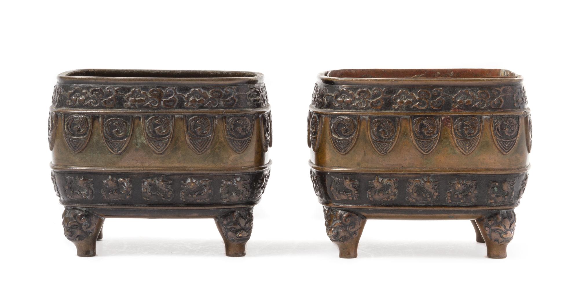 A Pair of Bronze Censers Height 3 1/2 inches.