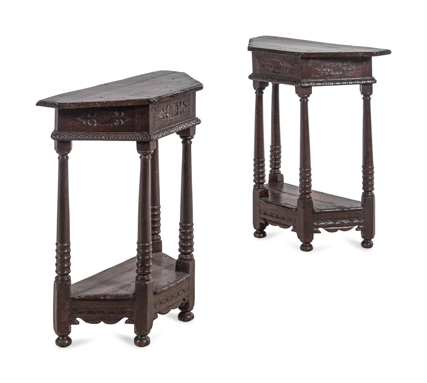 A Pair of Continental Carved Oak Console Tables