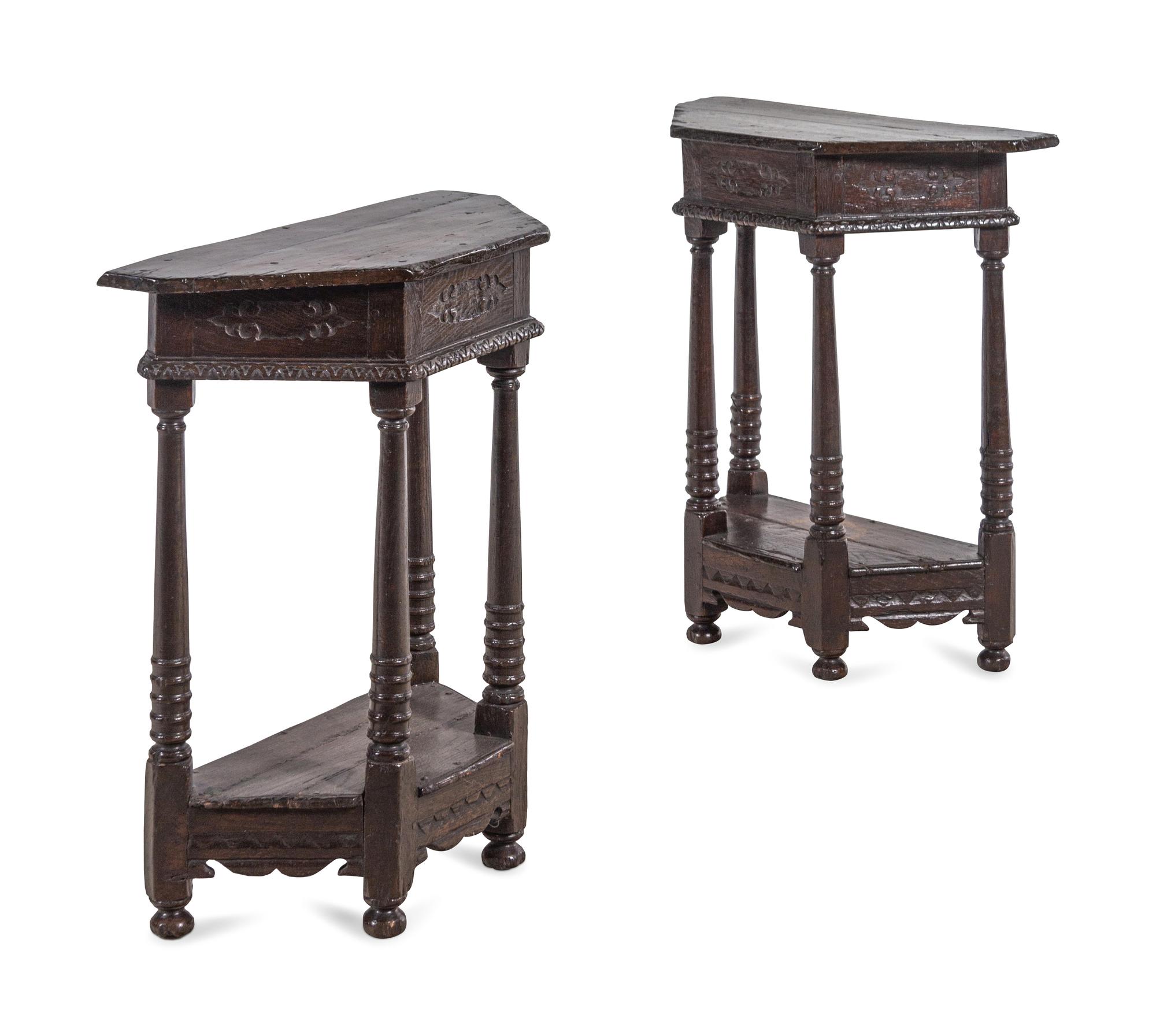A Pair of Continental Carved Oak Console Tables