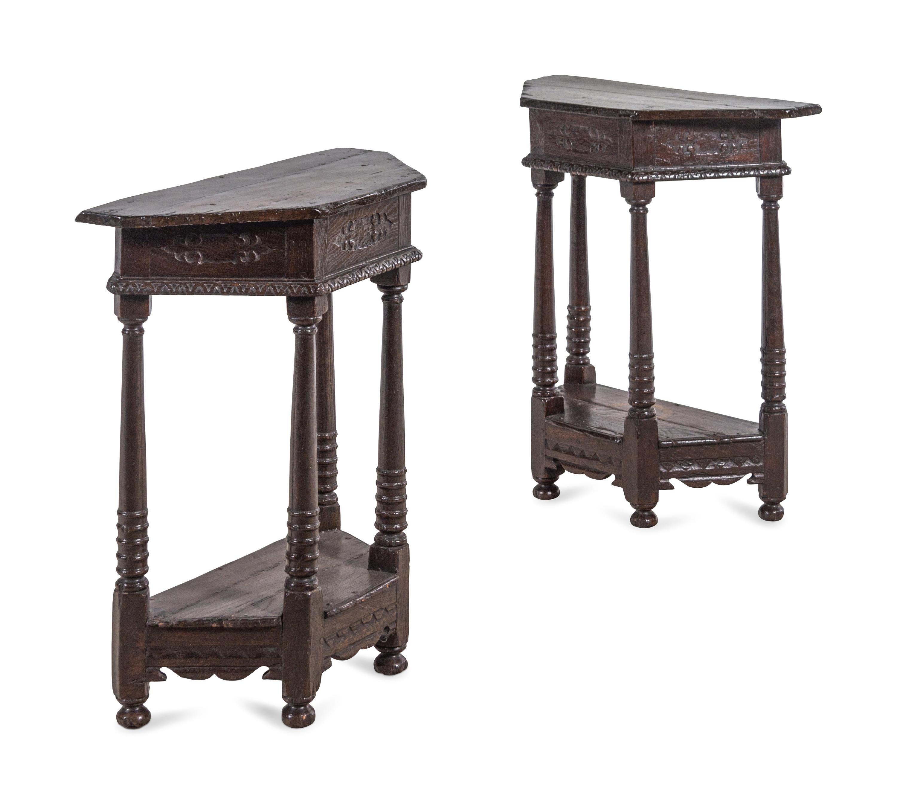A Pair of Continental Carved Oak Console Tables