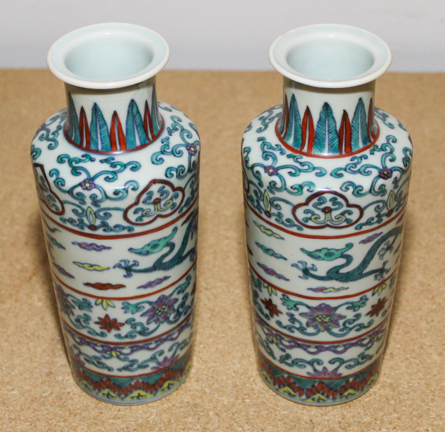 A Pair of Polychrome Glazed Vases. Height of each 7 3/4 inches.