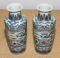 A Pair of Polychrome Glazed Vases. Height of each 7 3/4 inches.