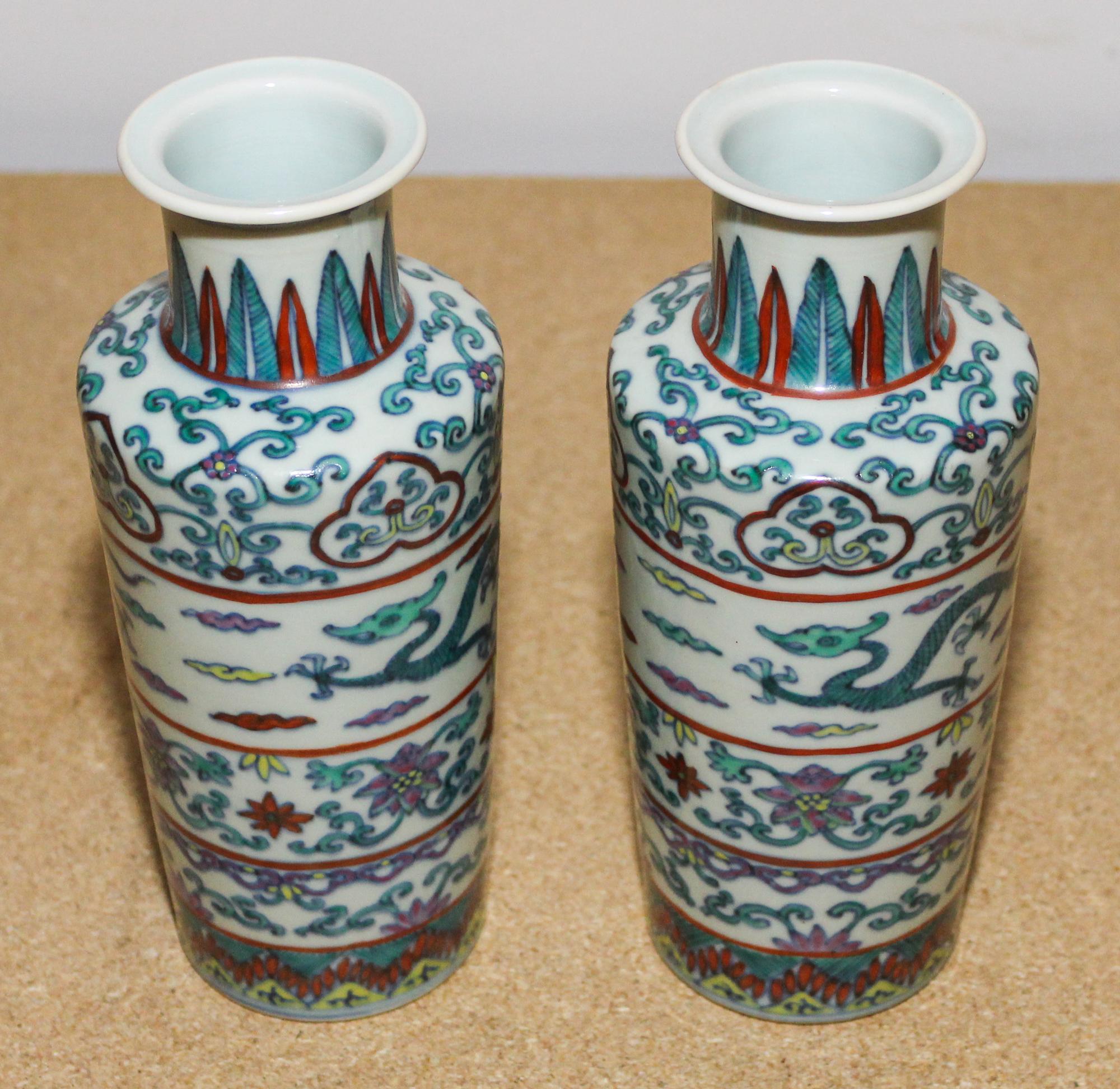 A Pair of Polychrome Glazed Vases. Height of each 7 3/4 inches.