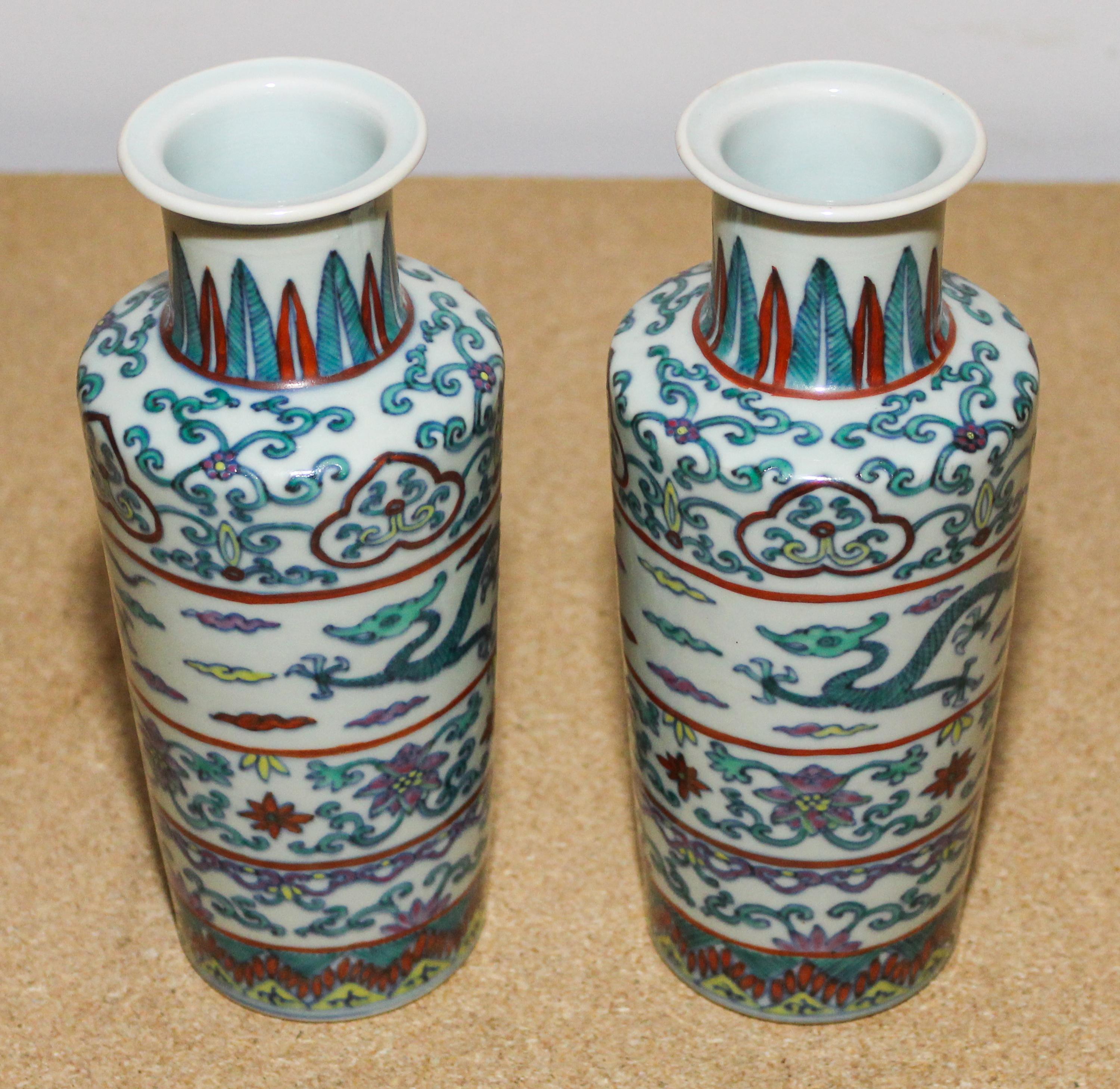 A Pair of Polychrome Glazed Vases. Height of each 7 3/4 inches.