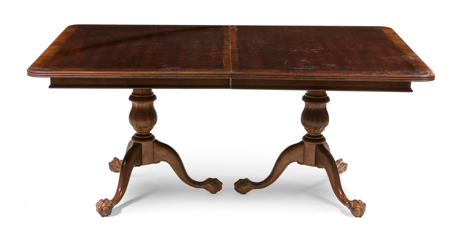 A Georgian Style Mahogany Double Pedestal Table, Height 30 x width 46 x depth 34 1/2 inches.