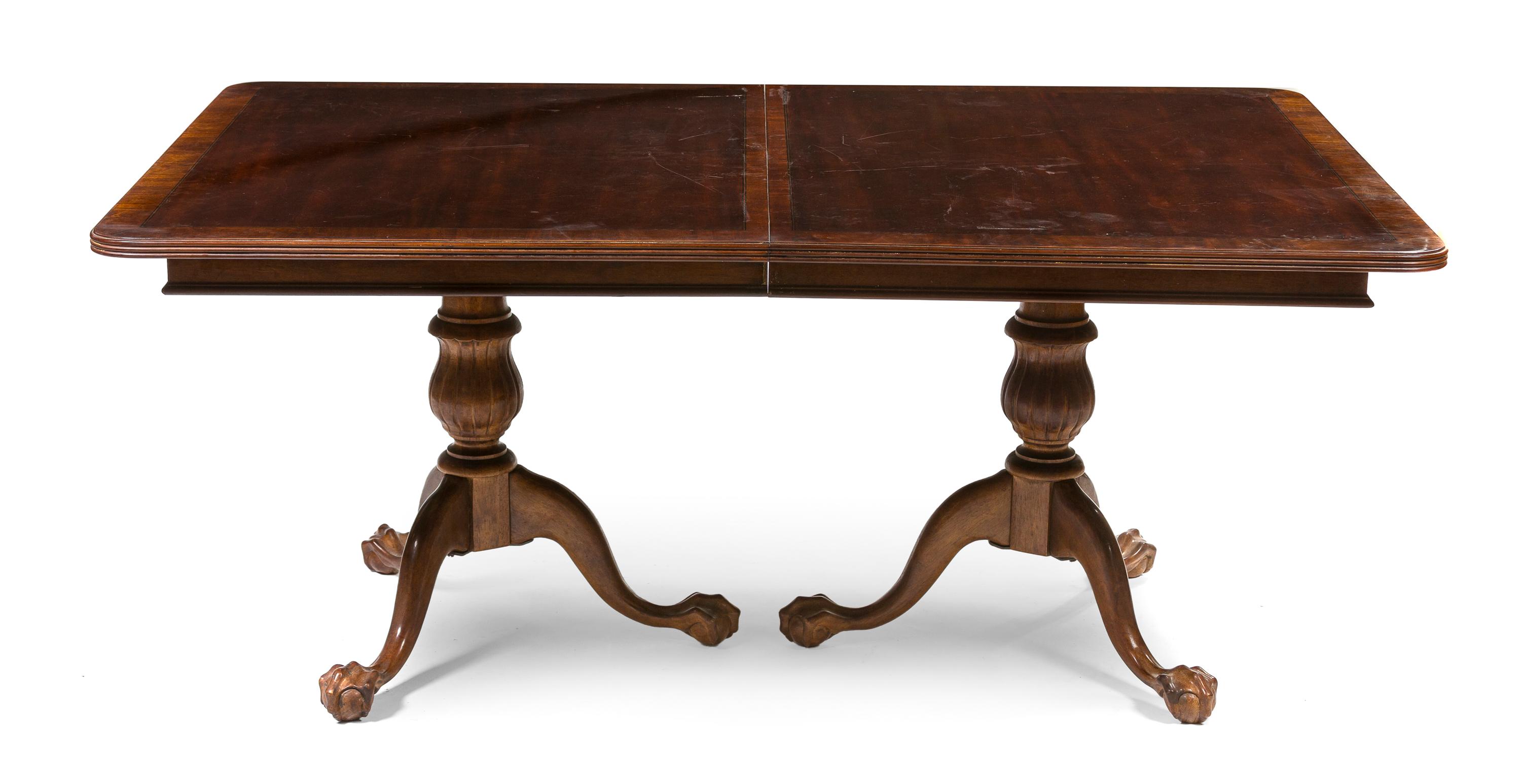 A Georgian Style Mahogany Double Pedestal Table, Height 30 x width 46 x depth 34 1/2 inches.