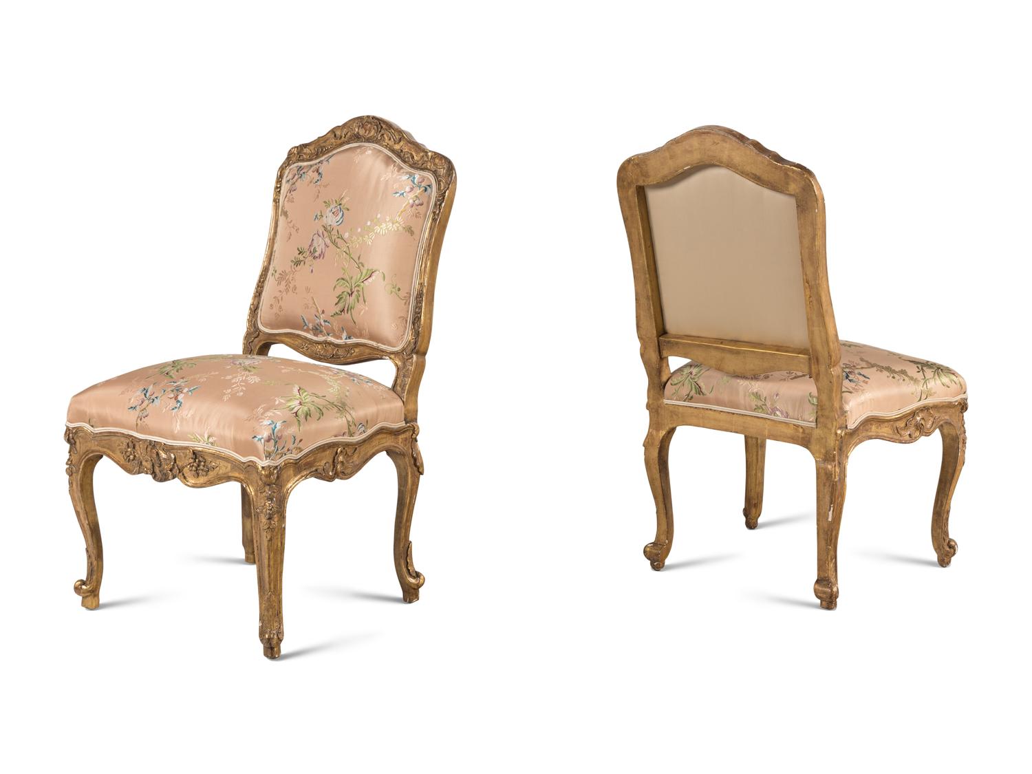 A Set of Ten Régence Style Giltwood Dining Chairs