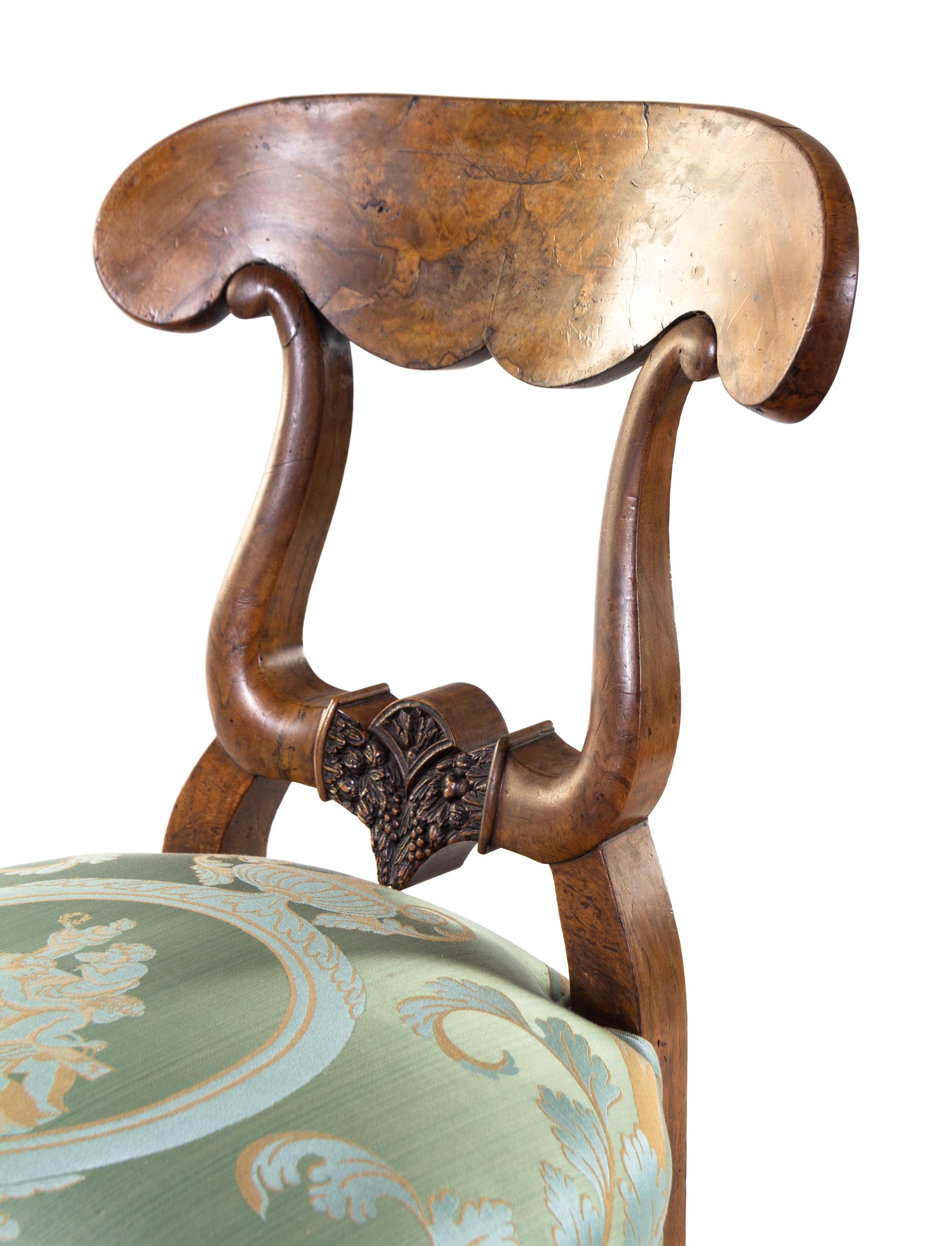 A Set of Four Biedermeier Foliate Carved Burl Walnut Side Chairs