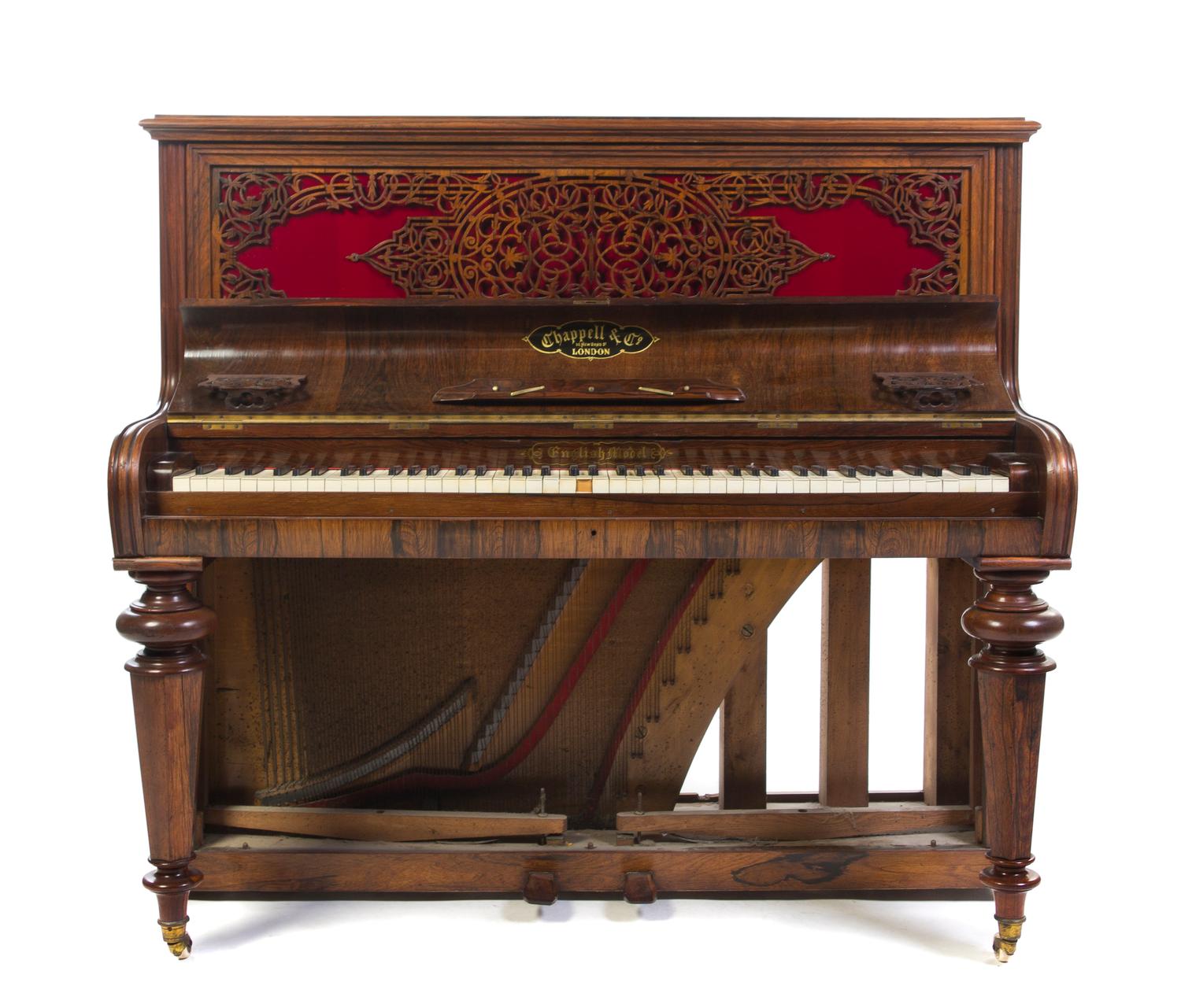 A Victorian Upright Rosewood Piano, Chappell & Co., Height 49 x width 53 1/4 x depth 26 inches.