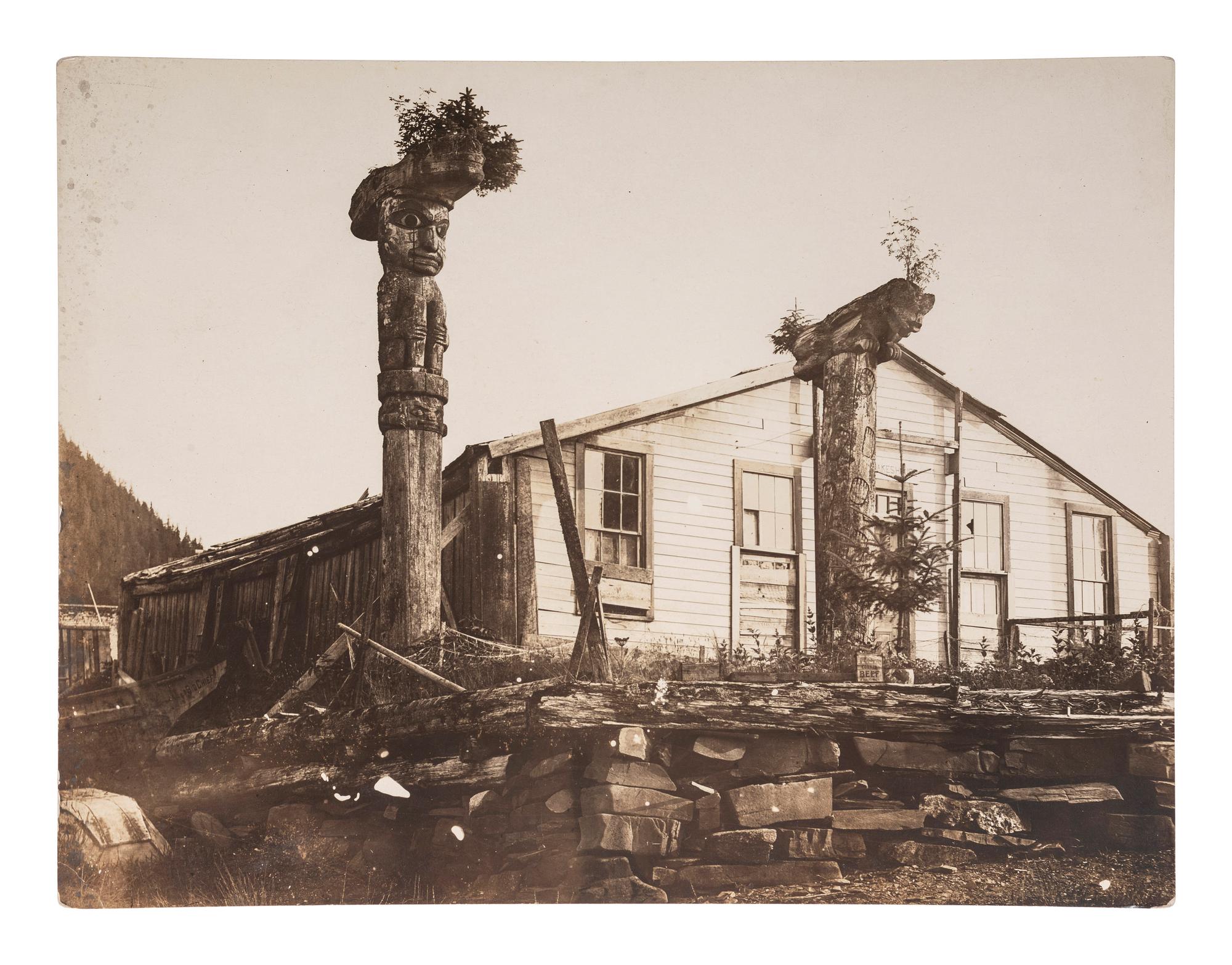 [NATIVE AMERICANS]. STODDARD, Seneca Ray (1844-1917), photographer. A group of 2 photographs of Tlingit Chief Shakes totem poles and home, Fort Wrangell, Alaska.