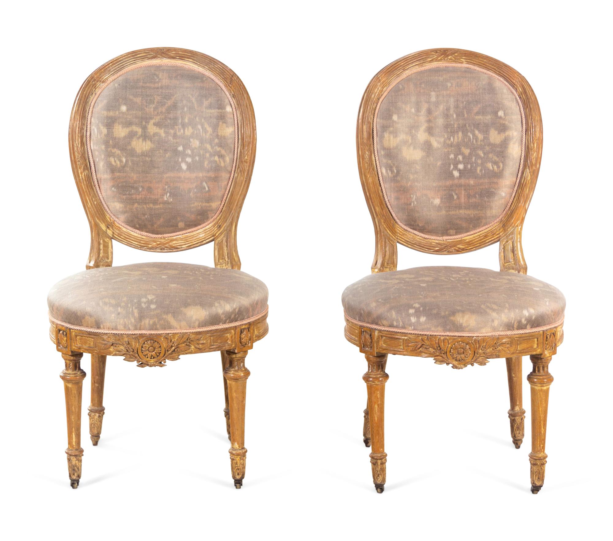 A Pair of Louis XVI Cerused Wood Side Chairs