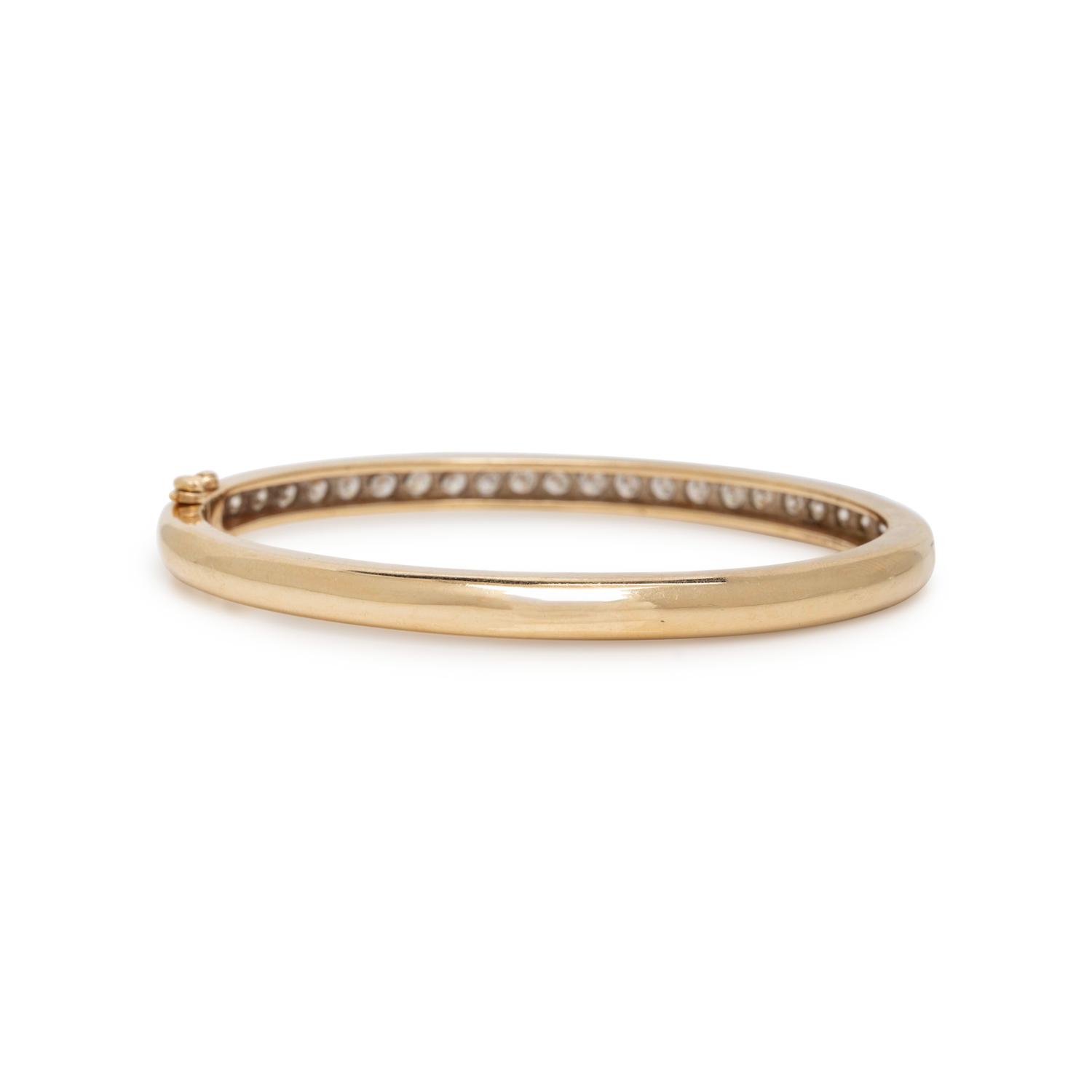 DIAMOND AND YELLOW GOLD BANGLE BRACELET
