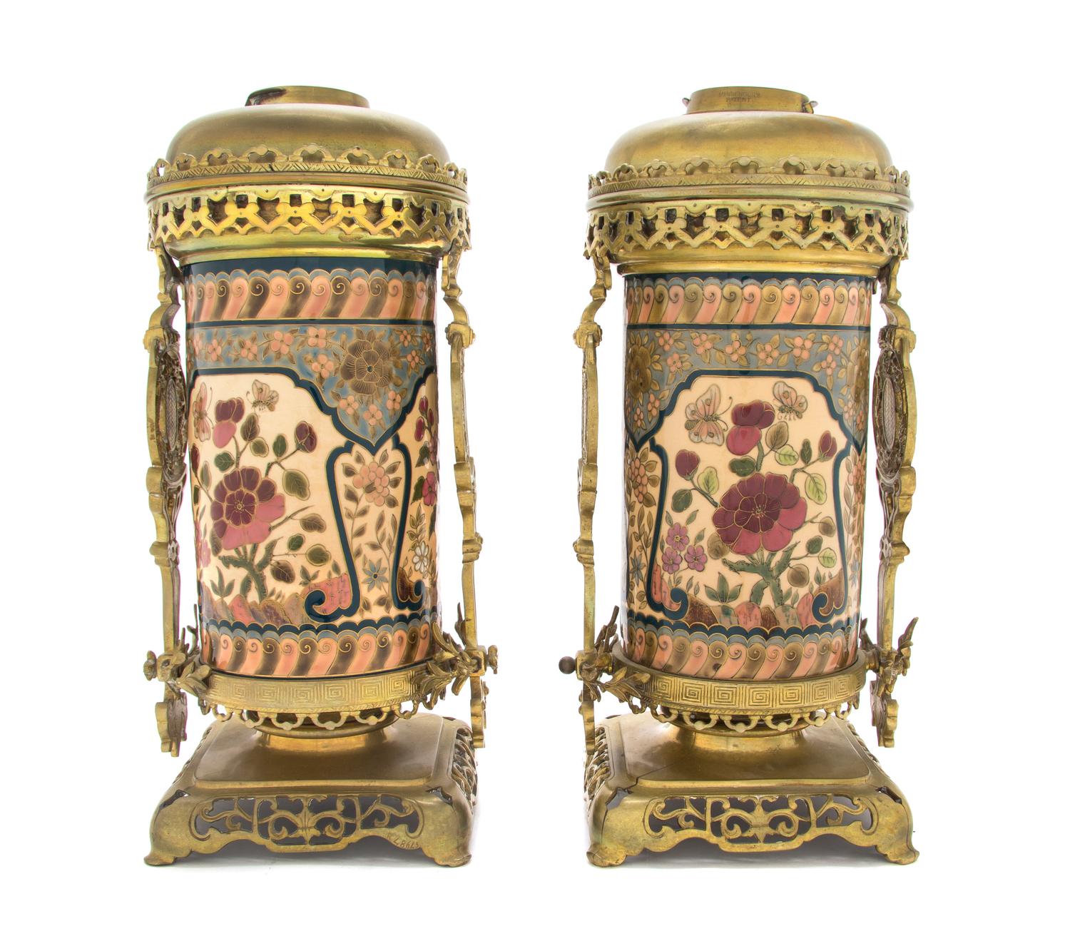 A Pair of Zsolnay Gilt Bronze and Brass Mounted Fluid Lamp Bases, Height 14 1/4 inches.