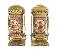 A Pair of Zsolnay Gilt Bronze and Brass Mounted Fluid Lamp Bases, Height 14 1/4 inches.