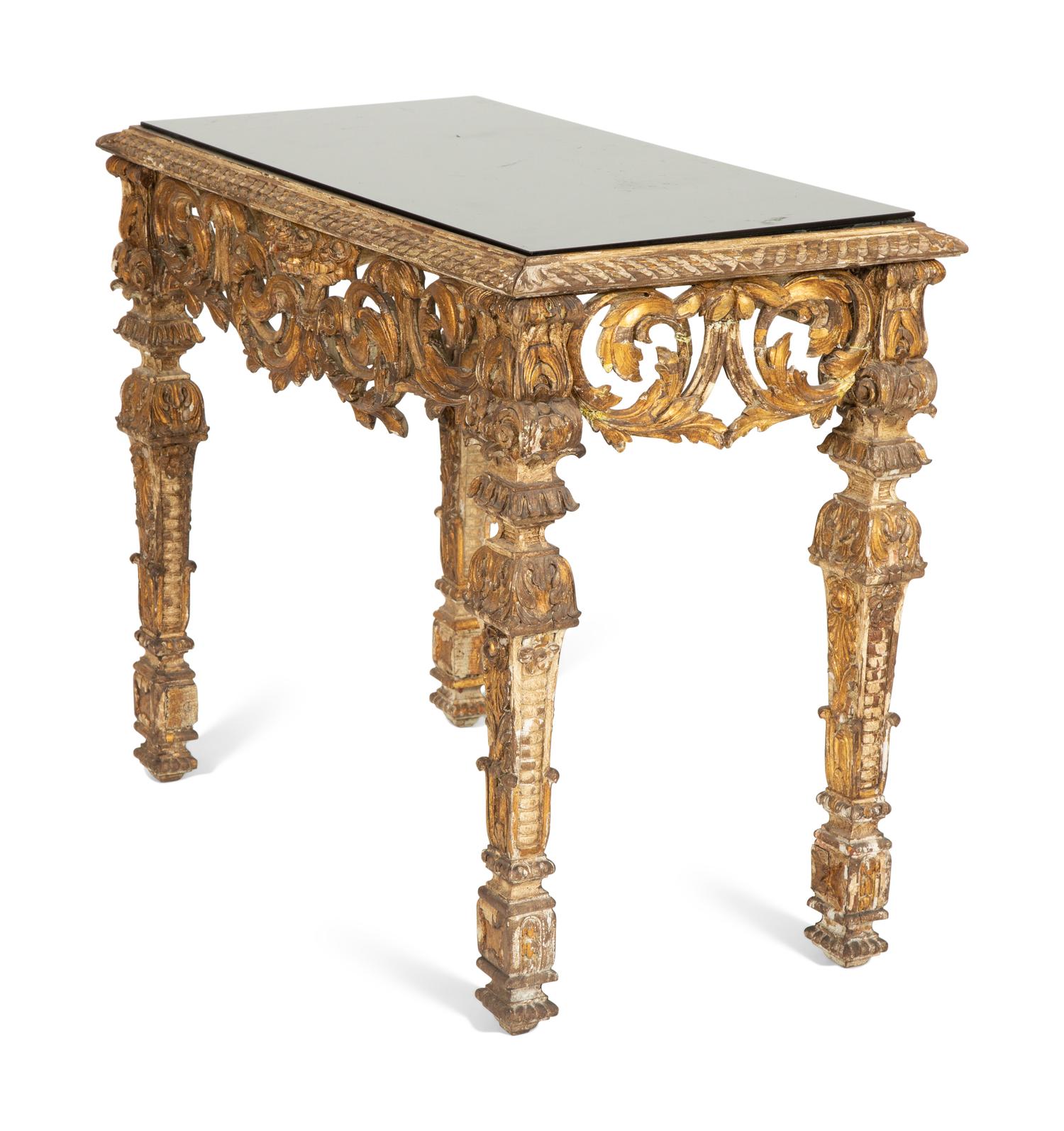 A Regence Style Giltwood Console Table with Black Glass Inset Top