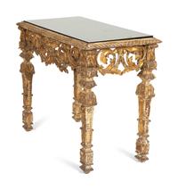 A Regence Style Giltwood Console Table with Black Glass Inset Top