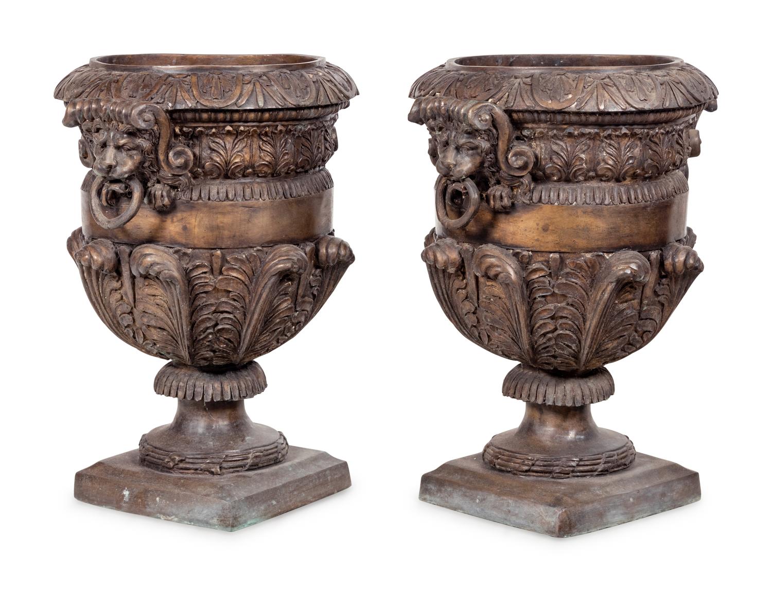 A Pair of Neoclassical Style Cast Metal Urns