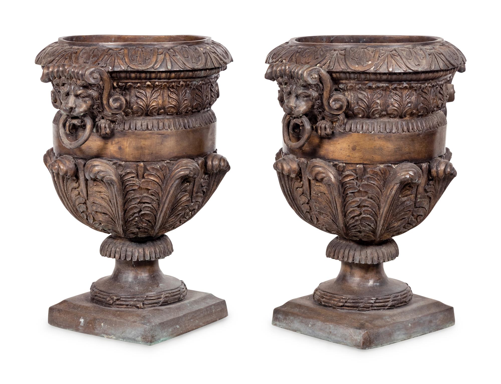 A Pair of Neoclassical Style Cast Metal Urns