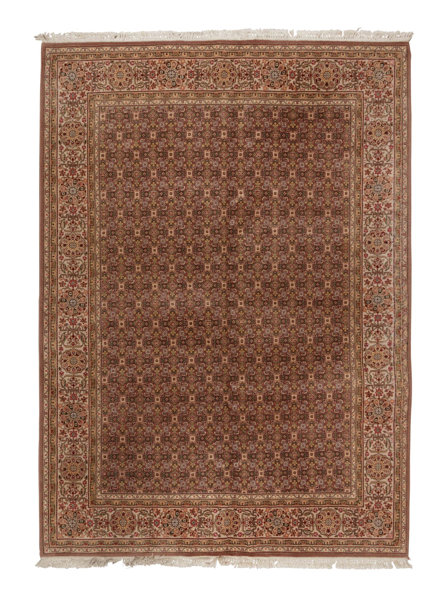 A Tabriz Wool Rug