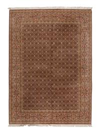 A Tabriz Wool Rug