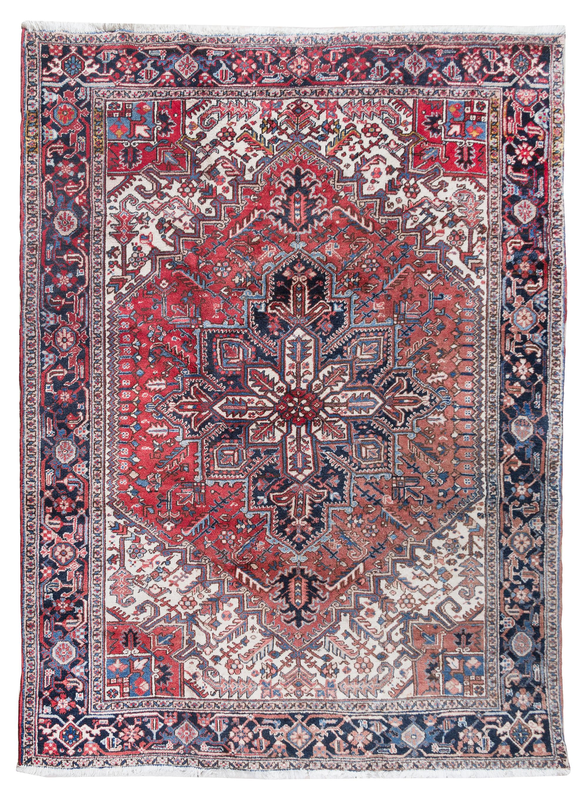 A Heriz Wool Rug 10 feet 1 inch x 8 feet 4 inches. — CIRCA 1920