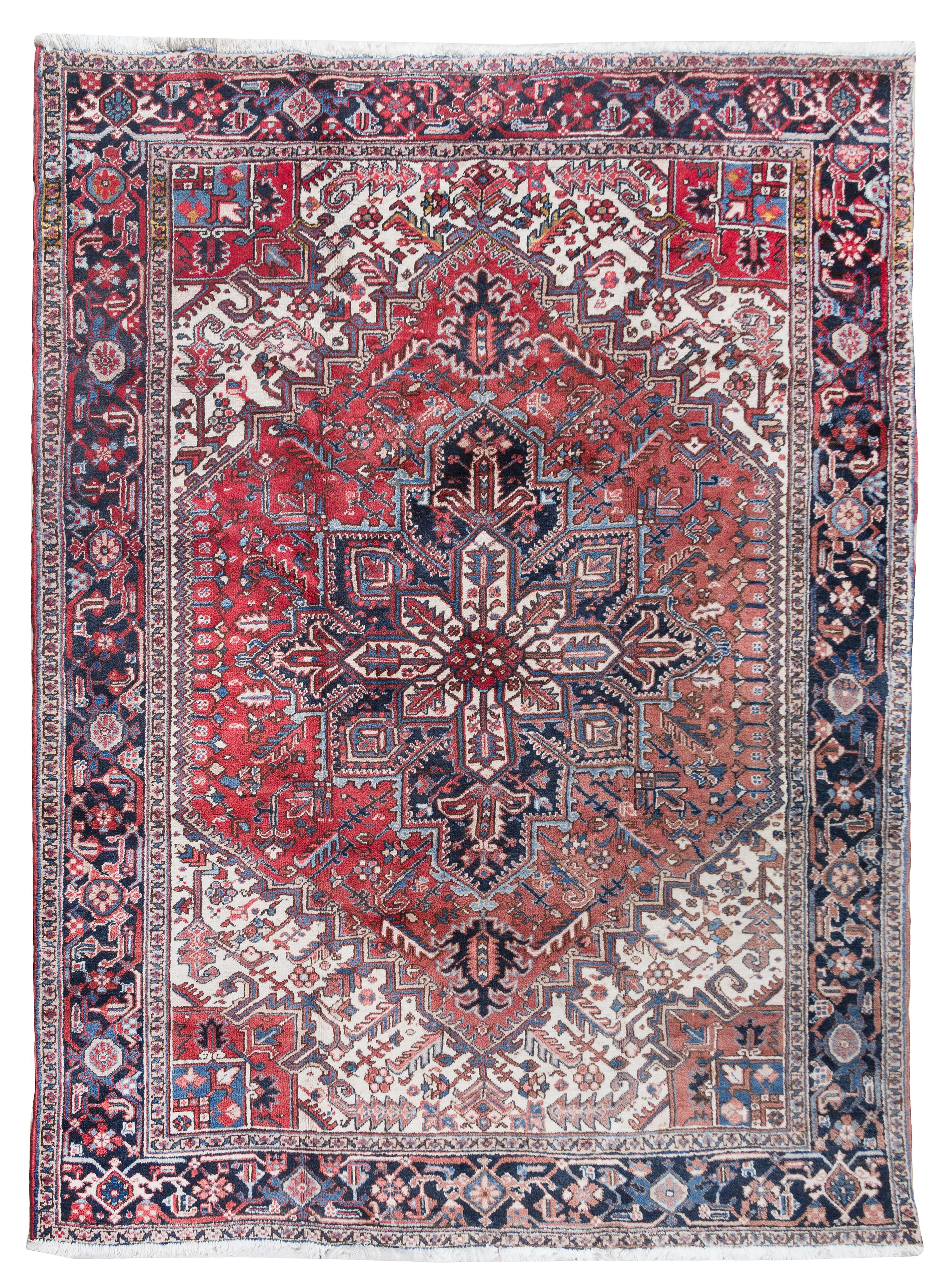 A Heriz Wool Rug 10 feet 1 inch x 8 feet 4 inches. — CIRCA 1920