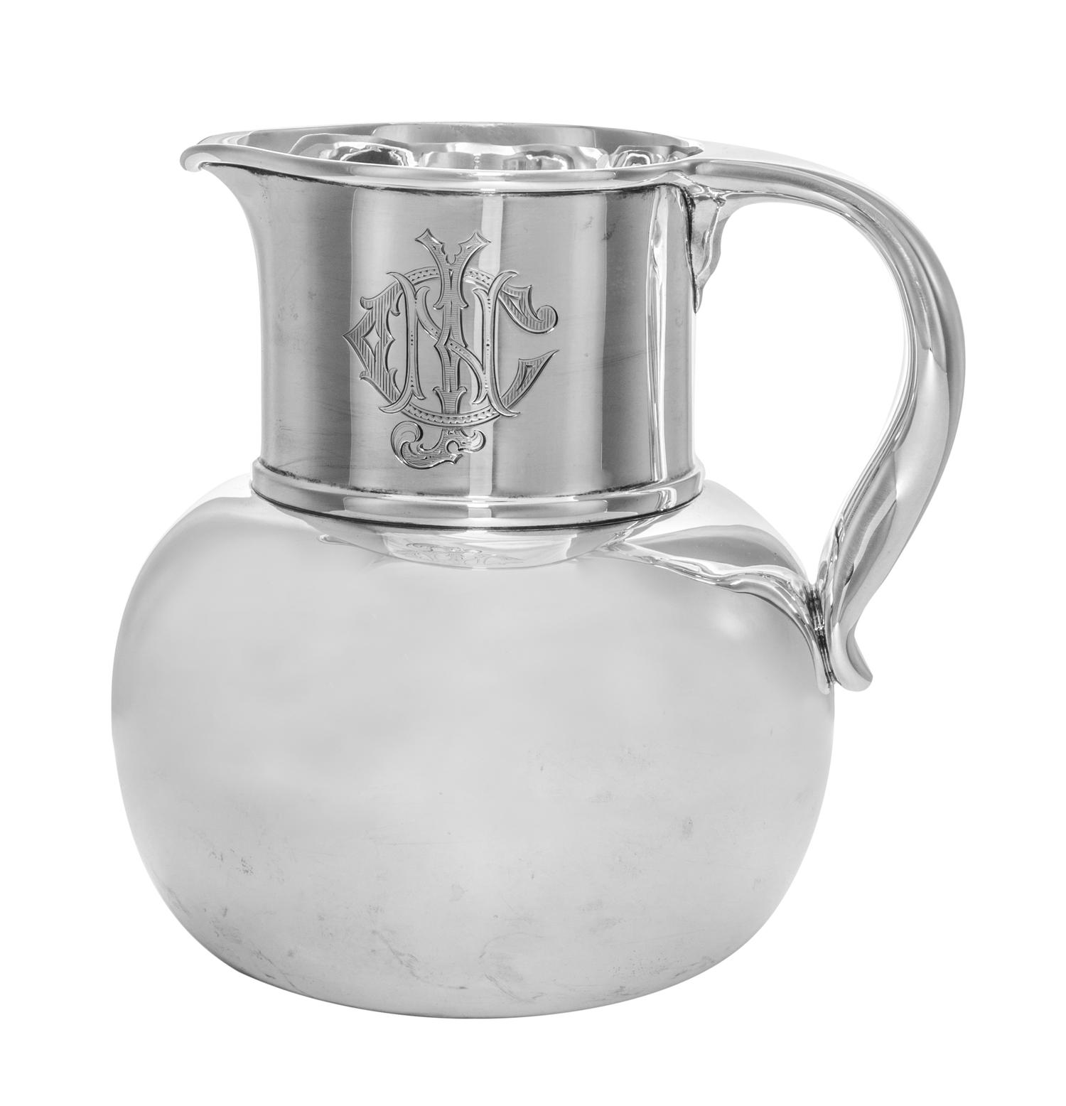 An American Silver Water Pitcher, Whiting Mfg. Co., New York, NY, Circa 1900, having a bulbous body and a cylindrical neck engraved wit