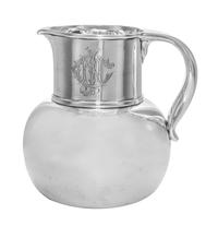 An American Silver Water Pitcher, Whiting Mfg. Co., New York, NY, Circa 1900, having a bulbous body and a cylindrical neck engraved wit
