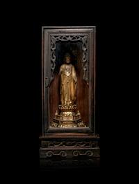 A Hardwood Shrine with a Gilt Wood Figure of Buddha