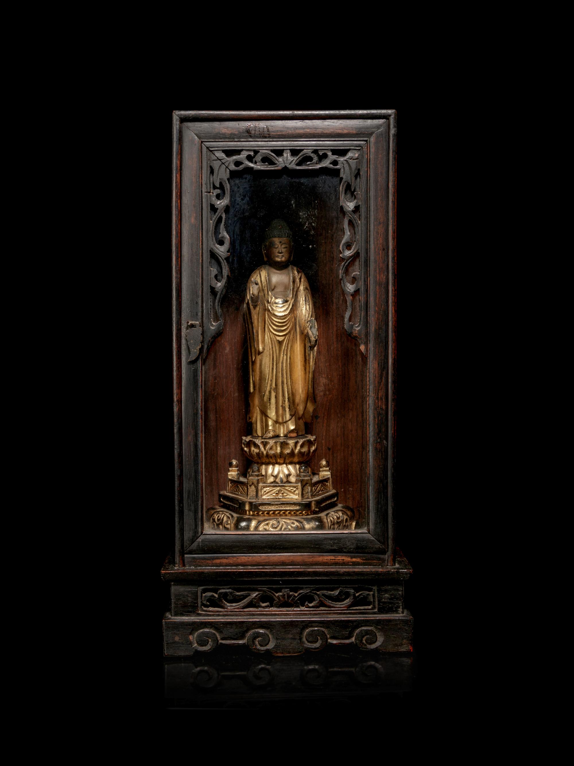 A Hardwood Shrine with a Gilt Wood Figure of Buddha