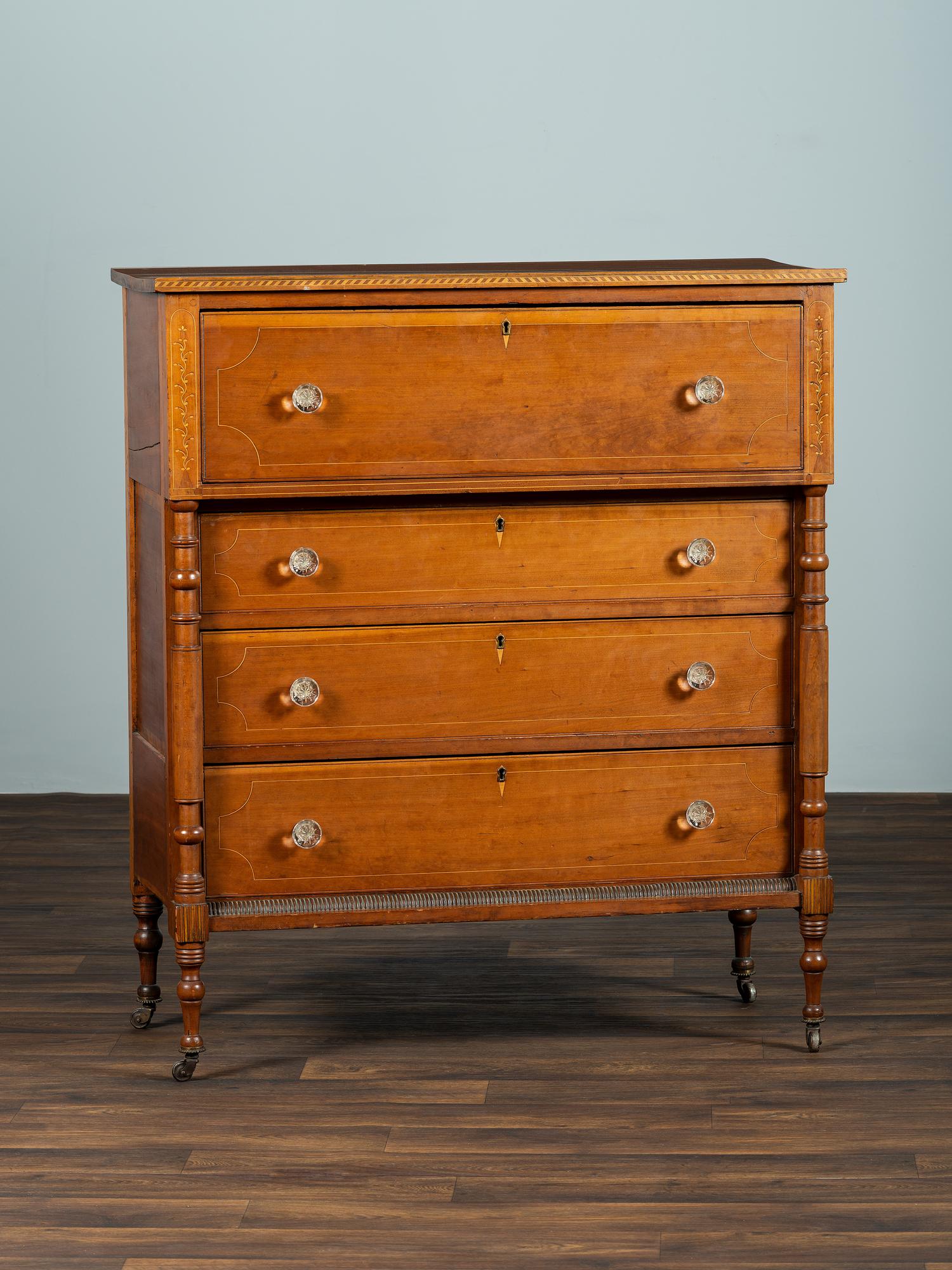 A Federal Inlaid and Turned Cherrywood Chest of Drawers