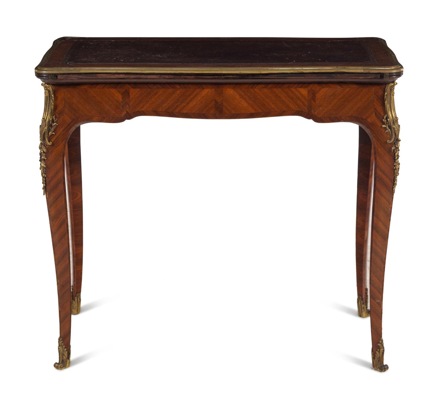 A Louis XV Style Gilt Bronze Mounted Tulipwood Flip-Top Writing Table