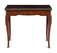A Louis XV Style Gilt Bronze Mounted Tulipwood Flip-Top Writing Table