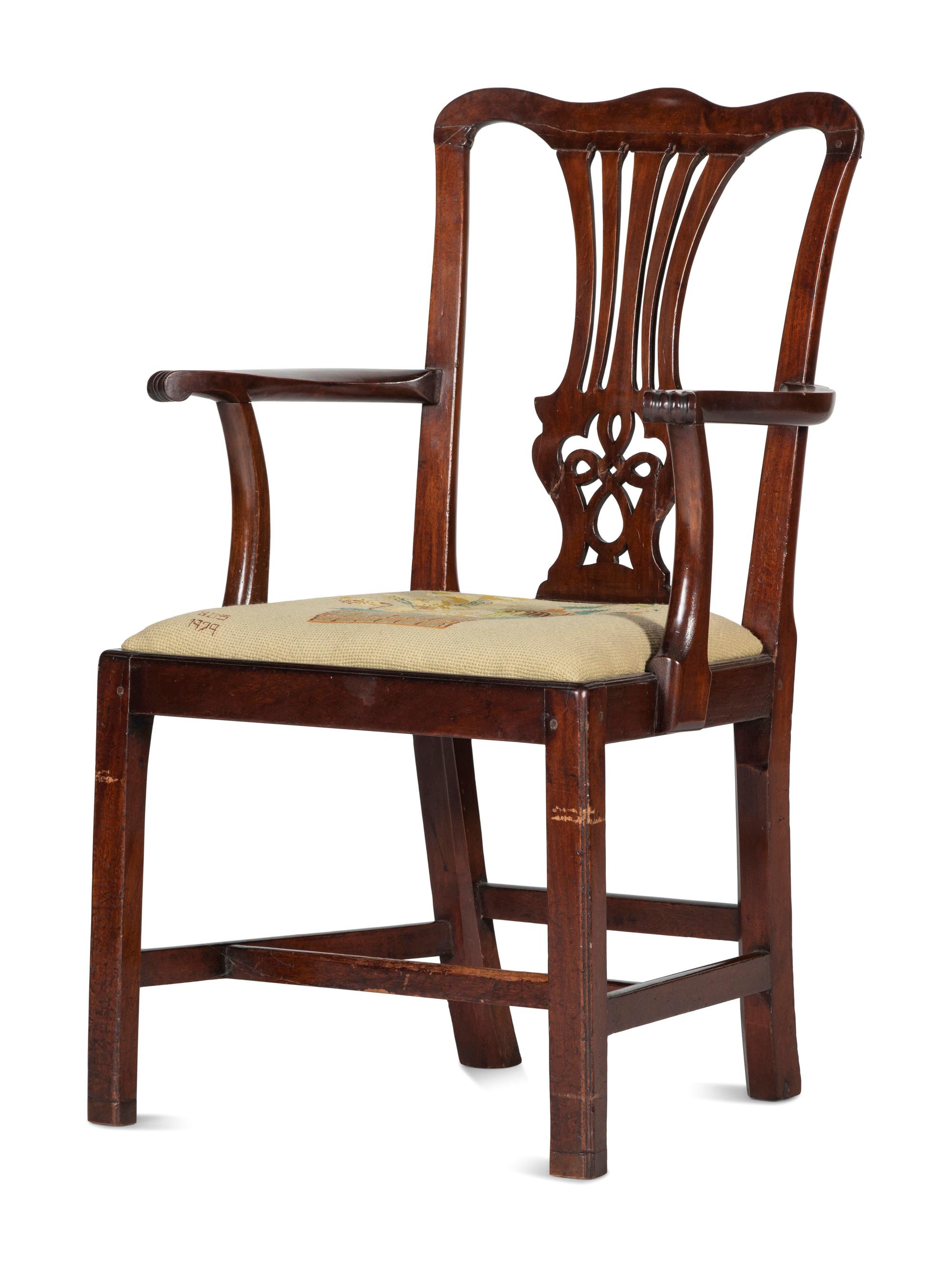 A Chippendale Carved and Figured Mahogany Armchair