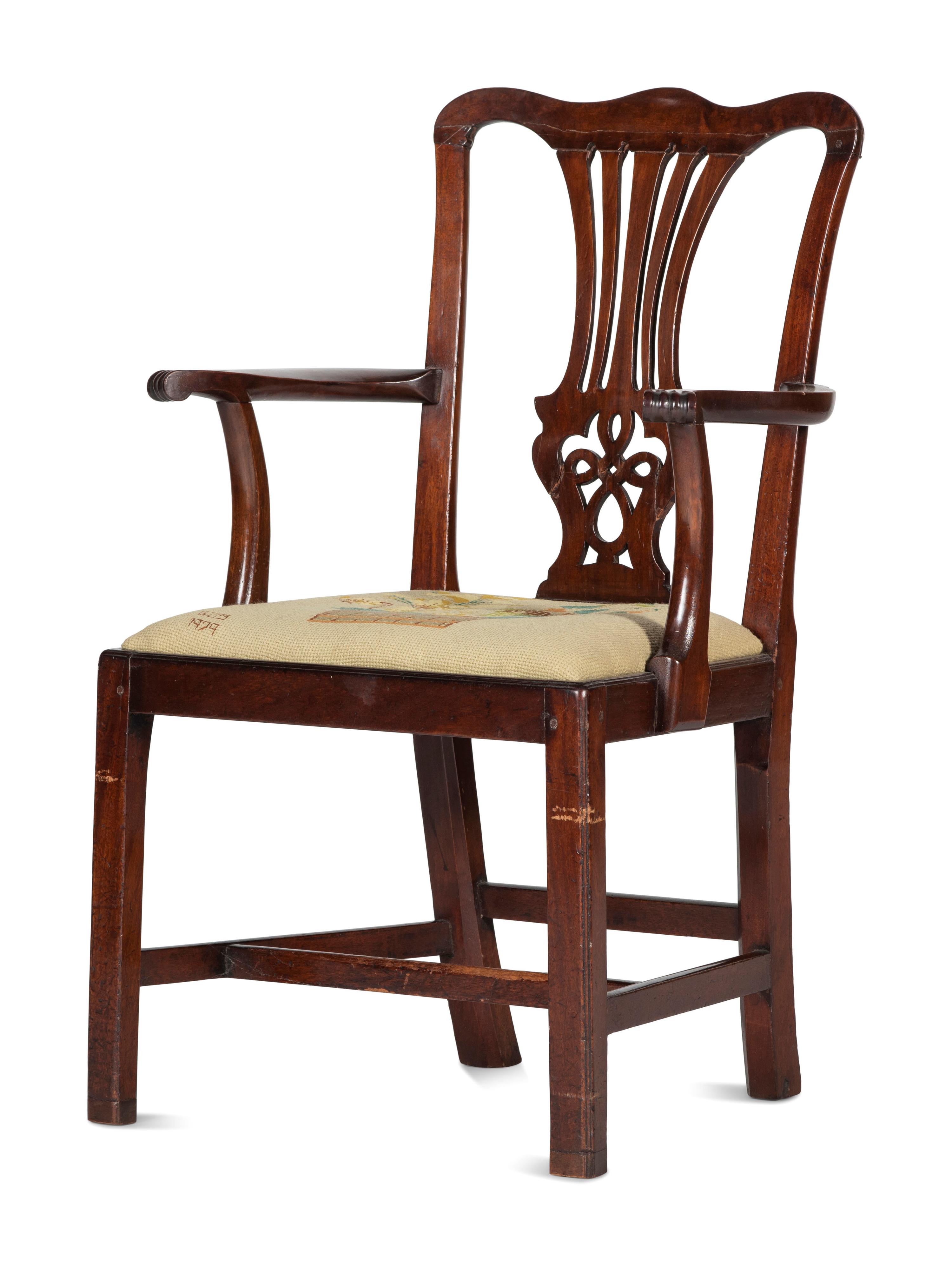 A Chippendale Carved and Figured Mahogany Armchair