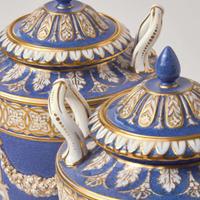 A Pair of Wedgwood Powder Blue Ground Covered Vases UK, circa 1910