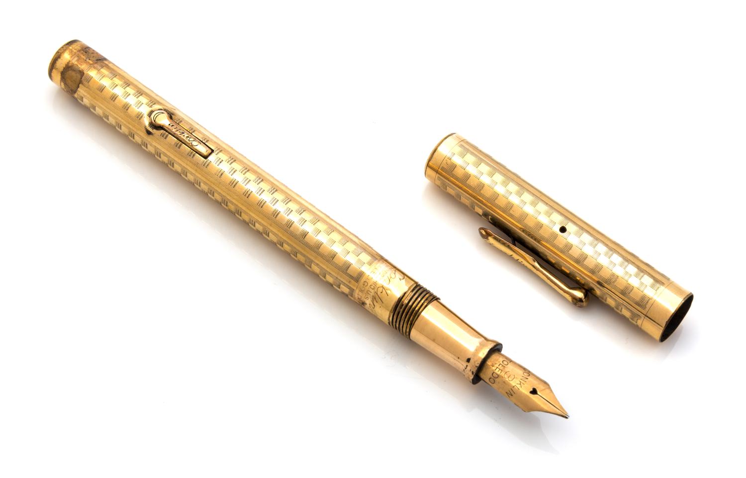 A Vintage Conklin Toledo Gilt-Metal Fountain Pen Length 4 7/8 inches.