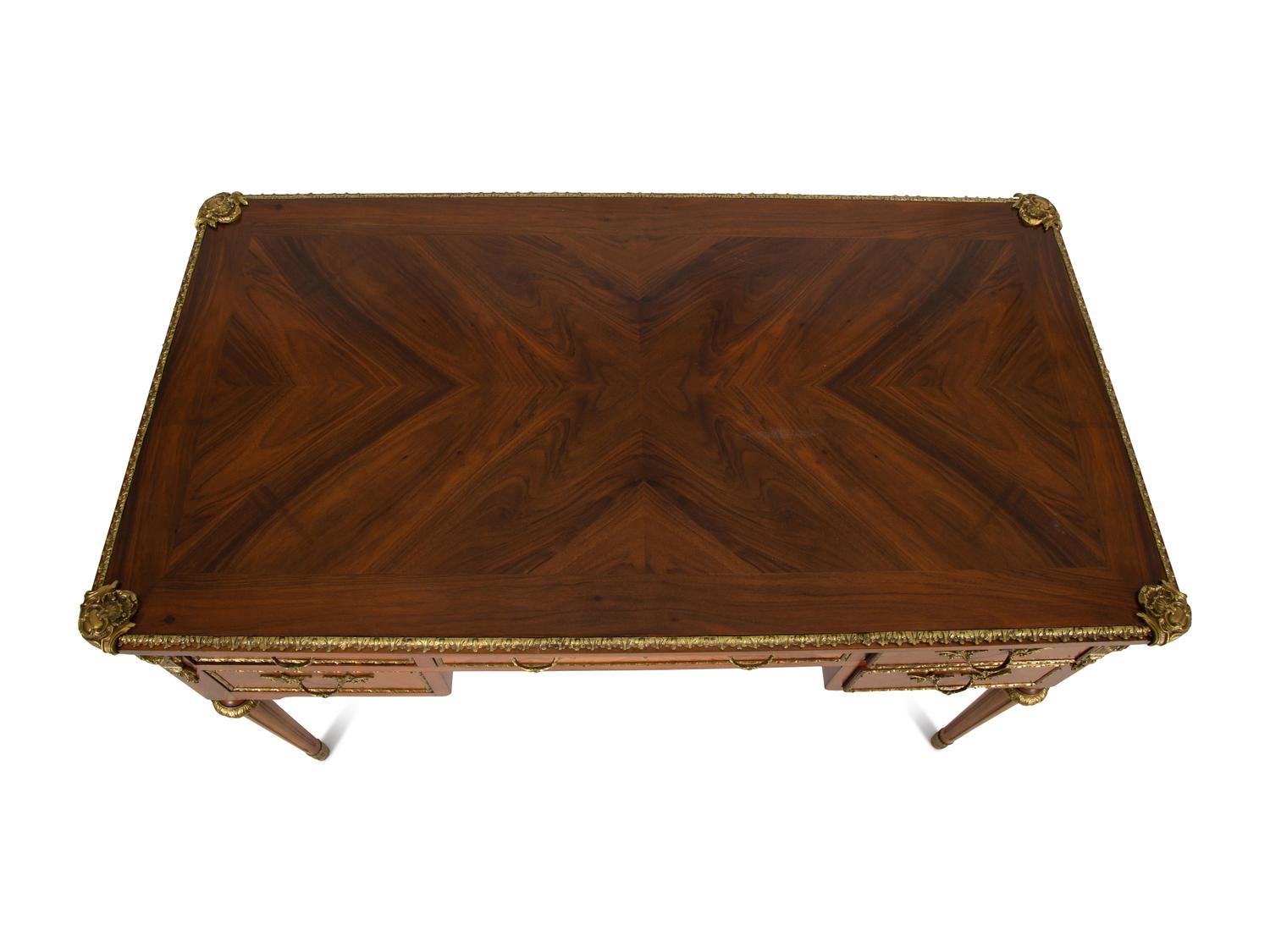 A Louis XVI Style Gilt-Bronze Mounted Mahogany Bureau Plat