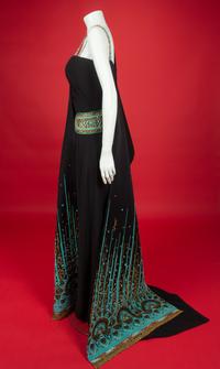 Christian Dior Haute Couture Dress and Shawl, 2008 — In 2008, Renée Fleming was the first woman to open the season of New York’s Metropolitan Opera. For the occasion, she wore four haute couture creations, including this dress by John Galliano for Christian Dior for her role as The Countess in Strauss’s Capriccio. Annie Lebovitz photographed Fleming in all four dresses for a 2008 Vogue article called ‘La Dolce Vida’ by Hamish Bowles. In the article, Galliano is quote as saying that Fleming’s voice, with its ‘whole timbre of colors, emotions, and tones, made me want to create something bold, vivacious, sensual, and capricious.’