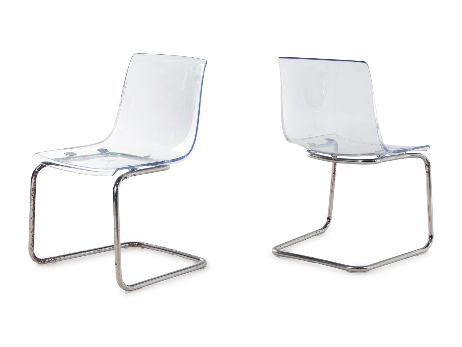 A Set of Three Contemporary Acrylic Nesting Tables and a Pair of Similar Side Chairs