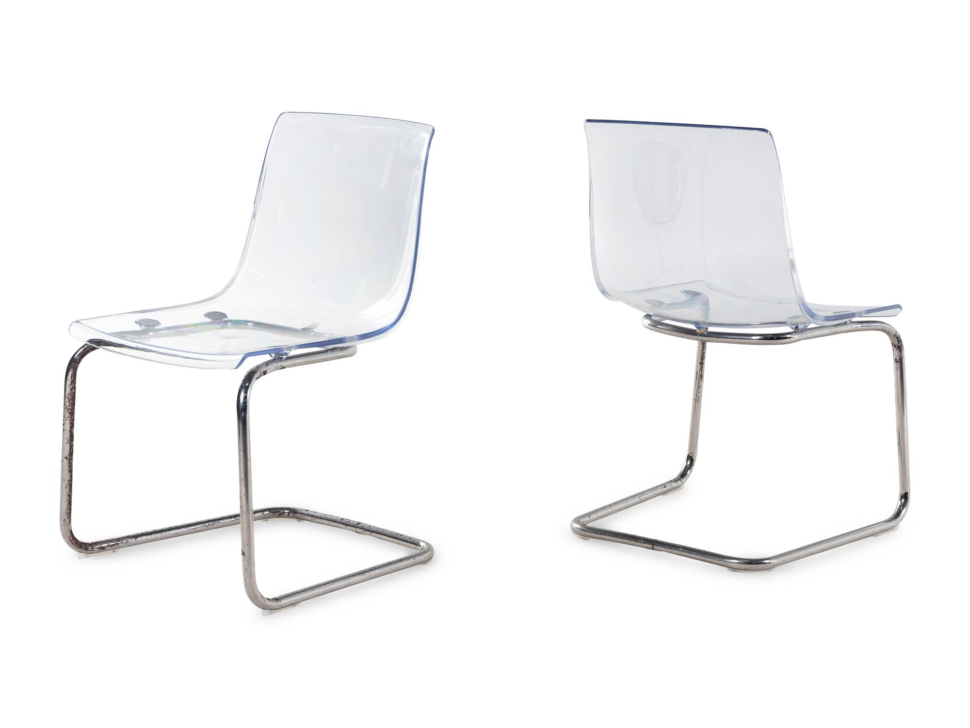 A Set of Three Contemporary Acrylic Nesting Tables and a Pair of Similar Side Chairs