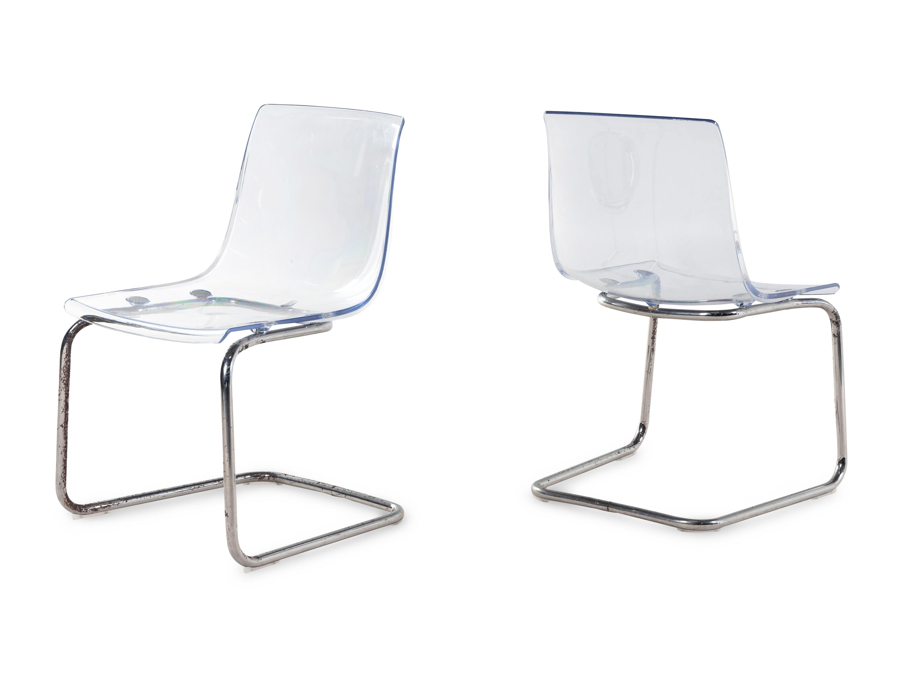A Set of Three Contemporary Acrylic Nesting Tables and a Pair of Similar Side Chairs