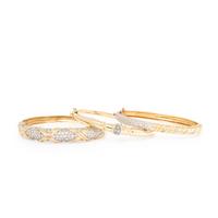 Three Yellow Gold and Diamond Bangle Bracelets