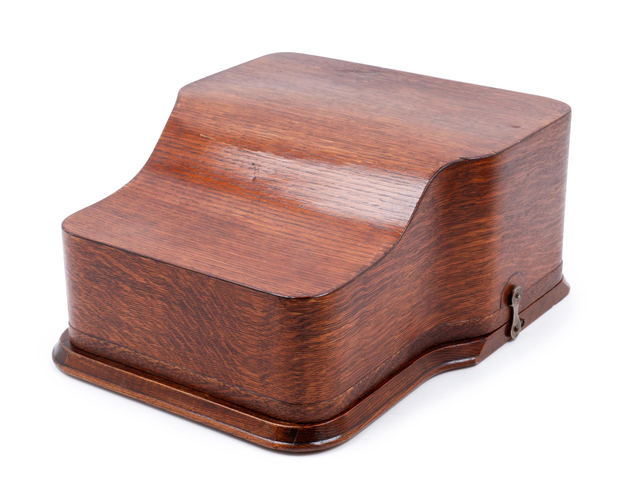 A Postal No. 5 Typewriter with a Wood Case