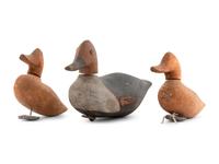 Three Diminutive Carved Wood Duck Decoys