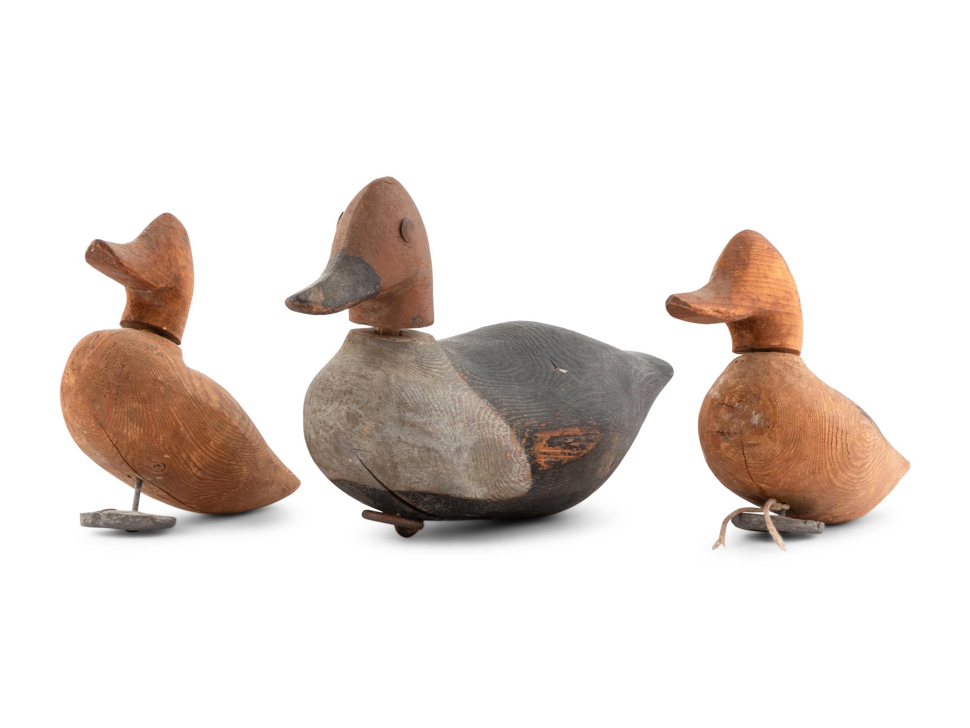 Three Diminutive Carved Wood Duck Decoys