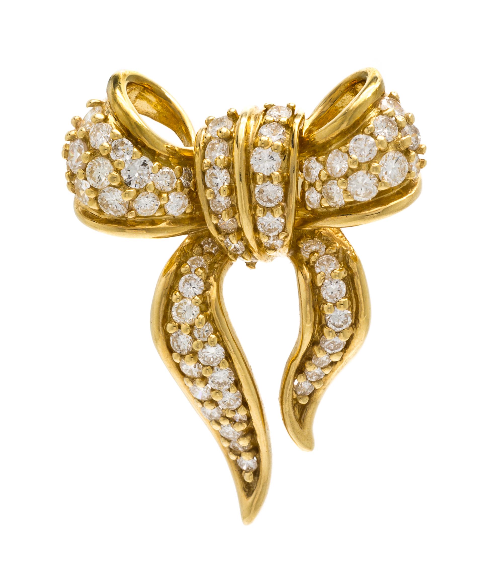 A Yellow Gold and Diamond Bow Brooch, 7.40 dwts.